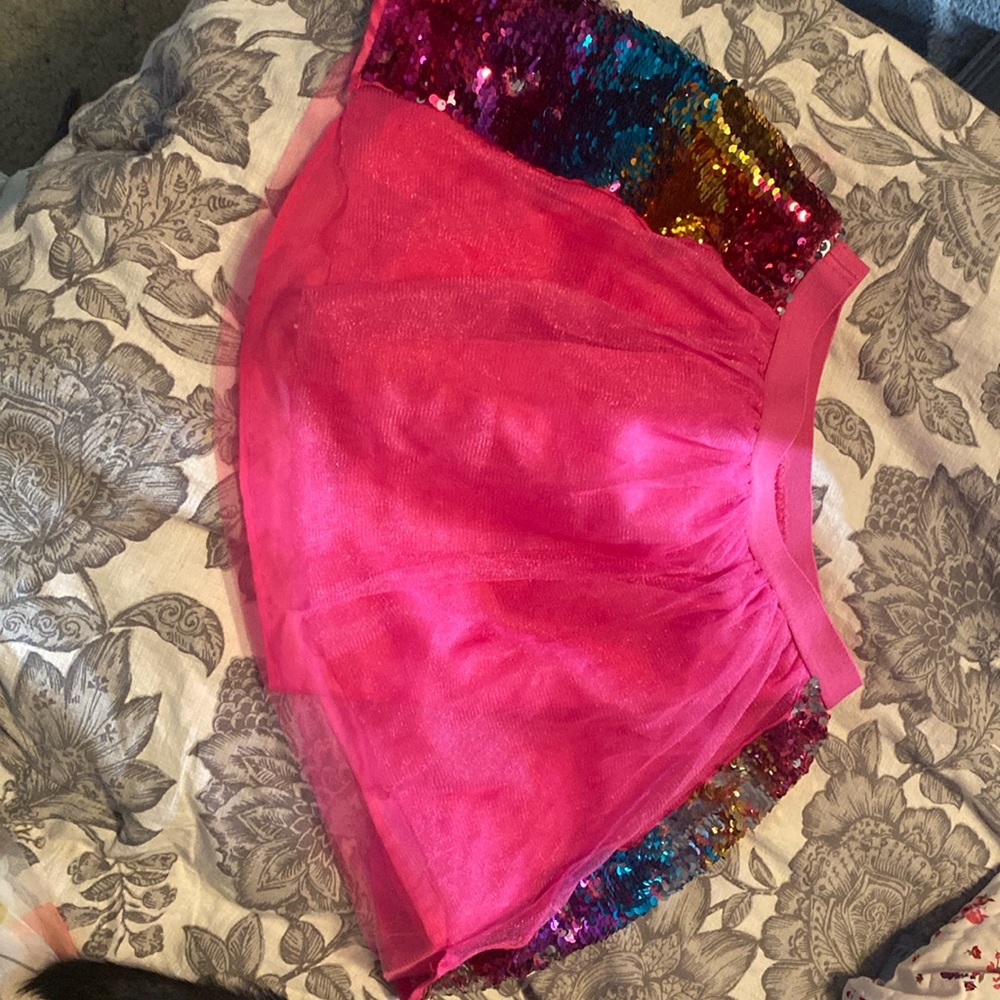 Beautiful pink skirt with rainbow sequins on the side